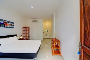 Capital O 92094 Hotel Kertha - Chambre