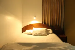 Apart y Hostal "El Puma" - Zimmer