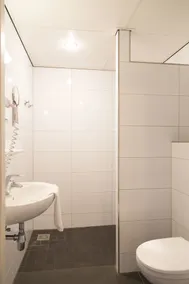 Strandhotel Vigilante - Badezimmer
