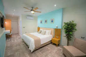 Bartolome Oceanfront Suites - Zimmer