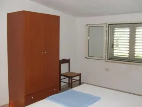 Tertenia rez-de-chaussée sud à 3 min à pied de la mer - Chambre