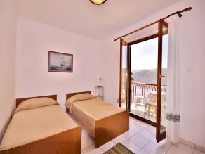 Familienfreundliche gemütliche Wohnung mit Grill und Terrasse | Neben dem Strand - Zimmer
