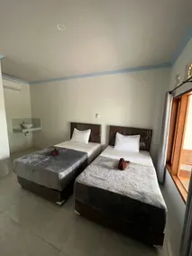 Kuta Circle Homestay - Zimmer