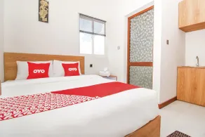 Hotel O Ayudia Guesthouse - Habitación