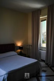 LA PUTEA SUITEsrl - Rum