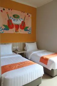 Front One Budget Waena Abepura - Chambre