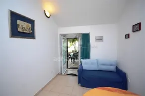 Apartmani Loredana - Apartment mit 2 Schlafzimmern und Meerblick - Wohnzimmer