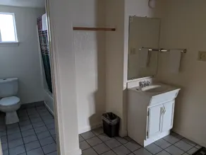 Deluxe Inn - Badezimmer