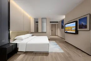 Blue Coast International Hotel Guangzhou - Zimmer