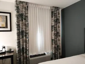 The Grove Inn and Suites - Zimmer