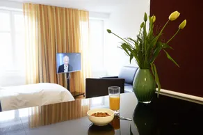 Residence Apartments by Hotel du Commerce - Camera