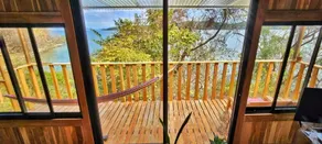 Teak house in a forest above the beach - Balcone