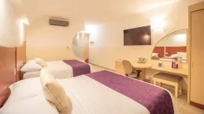 Hotel Magico Inn - Zimmer