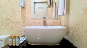 White Panda Hotels Royal Inn - Bad