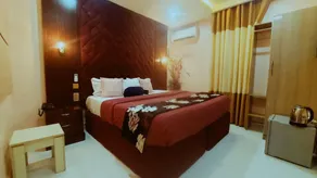 OLYMPUS HOTEL & SUITES - Zimmer