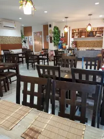 Grand Esie Service Apartment - Restaurant
