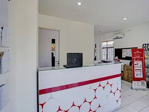 OYO LIFE 91594 Bungah Residence Syariah - Rezeption