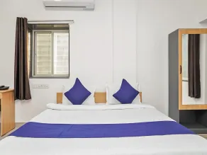 SILVERKEY EXECUTIVE STAYS 77140 VISHRANTWADI - Chambre