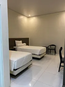 Genio Syariah Hotel Solo - Habitación