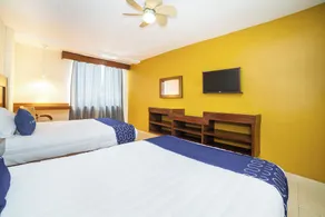 Capital O Hotel Casa Blanca - Chambre