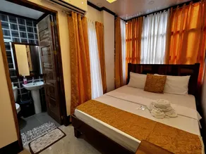 Aquilah Homestay Inn - Chambre