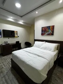 Fragrance Apartments and Suites - Zimmer