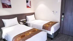 Lun Hotel Manado - Habitación