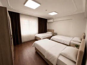 Lumiera Suites Hotel - Habitación