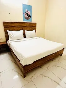 Hotel Green Arrow Rohini - Quarto