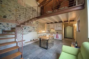 Charming Alessandria Apartment with Shared Pool & City Views - Living room