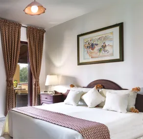 I Giardini di Cala Ginepro Hotel Resort - Habitación