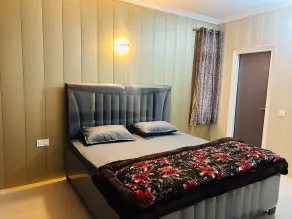 Experience comfort, space, and privacy at Stay Royal Landran 3 BHK - Chambre