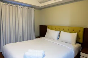 Amazing 2BR with City View The Wave Kuningan Apartment By Travelio - Værelse