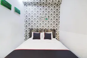 Hotel O Jalan Jenderal Sudirman Near Imam Bonjol Square Formerly Nelvi Guest House - Chambre