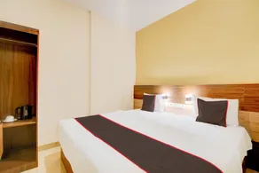 Capital O Pusat Kota Pekanbaru Near Mall Living World Formerly Radja Homestay - Room