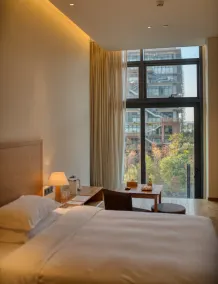 Taihua Wutong Hotel - Room