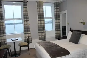 Commodore Hotel - Habitación