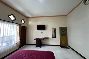Taxa Raya Guest House - Room