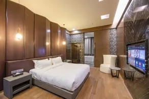 M Man Hotel  - Pokój