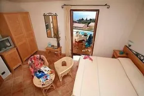 Hotel Villa Gustui Maris - Rum