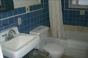 Economy Inn - Baño