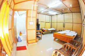 Palm Grove Eco Resort - Zimmer