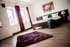 Aparthotel - Stadtvilla Premium - Chambre