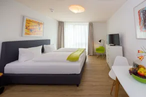 Country Inn Suitenhotel - Chambre