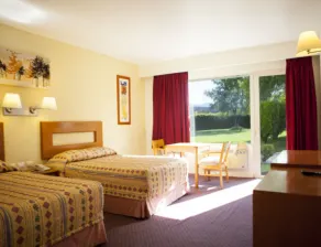 Hotel Paradise Inn - Chambre