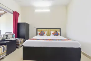 Fabhotel Green Acres - Chambre