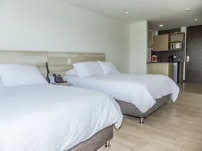 MG Hotels & Suites - Room