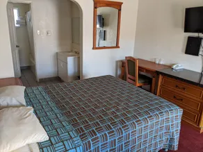 Deluxe Inn - Zimmer