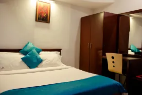 The Signature Inn Hotel - Room
