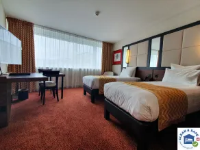 Nash Suites Airport Hotel - Chambre